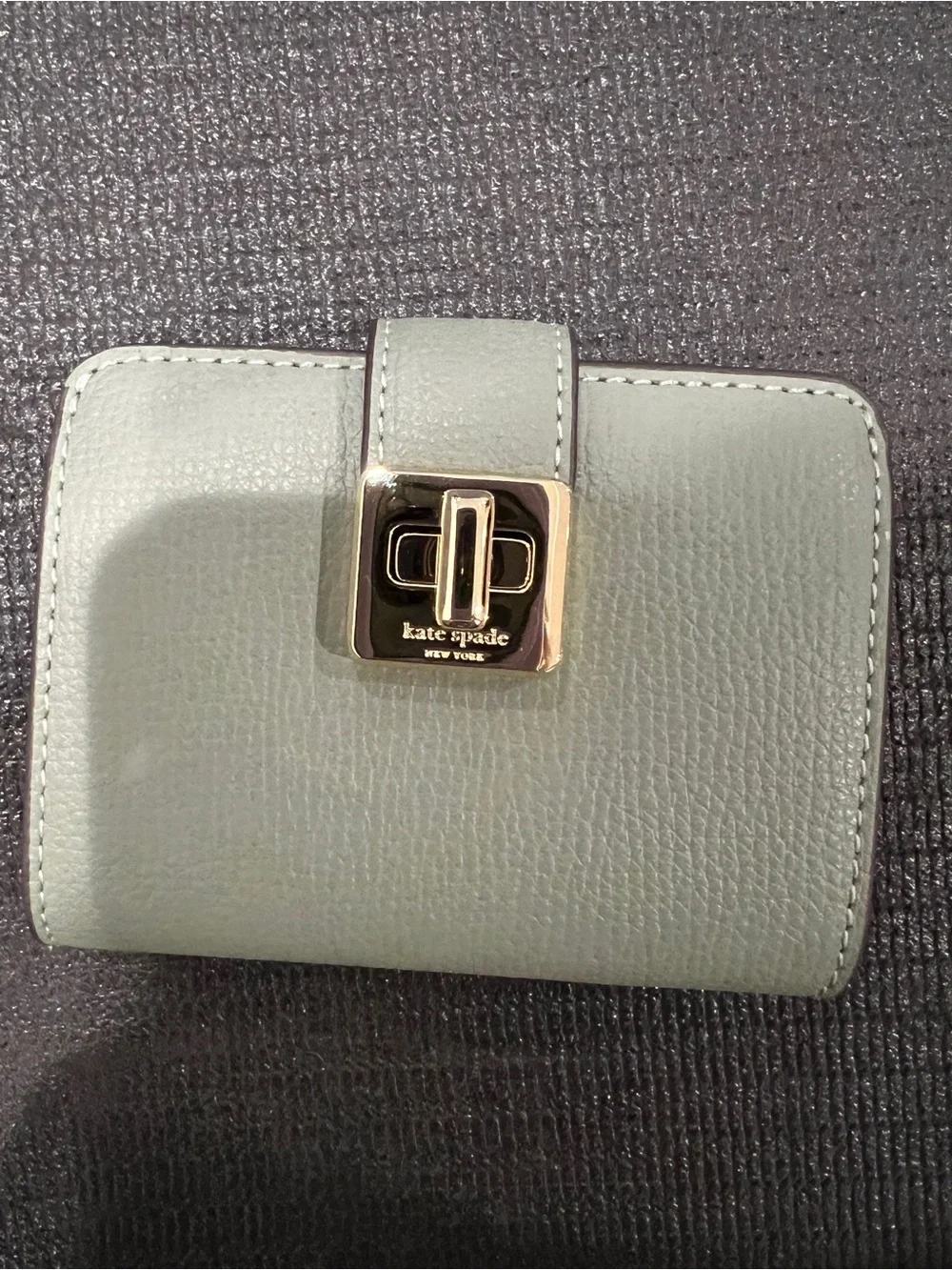 kate spade light sage pebbled leather wallet with gold clasp